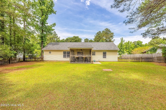 7394 Red Stone Ct, Leland, NC 28451 - rear view of house featuring a sunroom and a ceiling fan