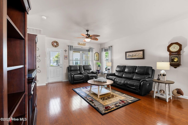 4007 Norseman Loop Unit 5, Southport, NC 28461 - living room with ceiling fan, hardwood / wood-style floors, and baseboards