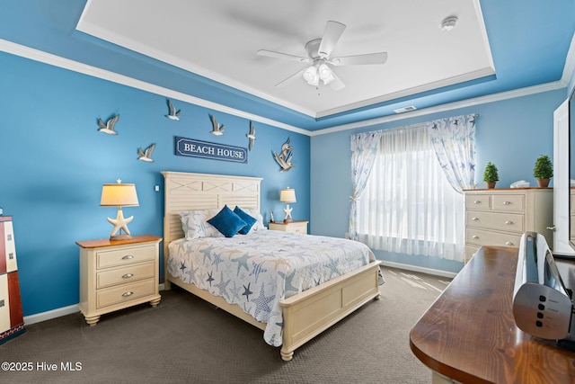 4007 Norseman Loop Unit 5, Southport, NC 28461 - bedroom with a raised ceiling, dark carpet, ornamental molding, and baseboards