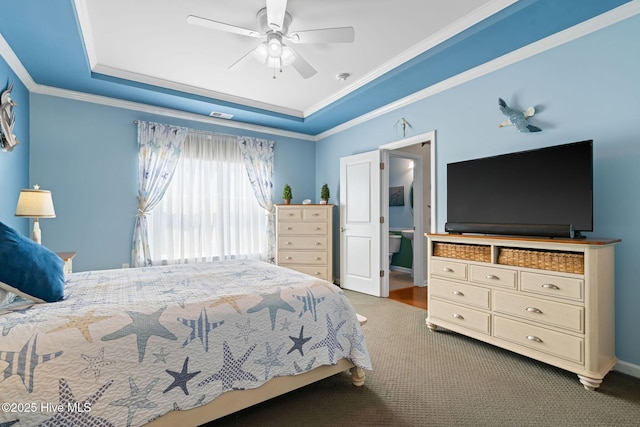 4007 Norseman Loop Unit 5, Southport, NC 28461 - carpeted bedroom with a tray ceiling, crown molding, and a ceiling fan