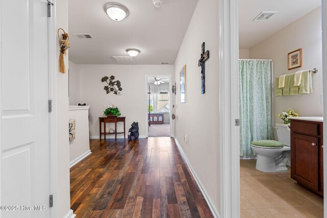 4007 Norseman Loop Unit 5, Southport, NC 28461 - corridor with wood finished floors and baseboards