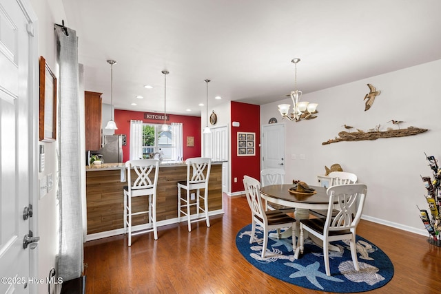 4007 Norseman Loop Unit 5, Southport, NC 28461 - dining room with wood finished floors, baseboards, a chandelier, and recessed lighting