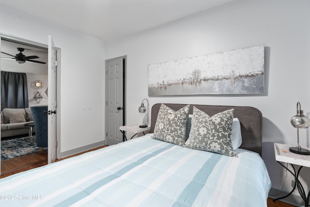 bedroom with wood finished floors