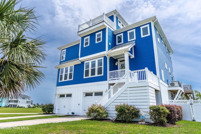 145 Whispering Pine Ln, Holly Ridge, NC 28445 - beach home with covered porch, a garage, stairs, driveway, and a balcony