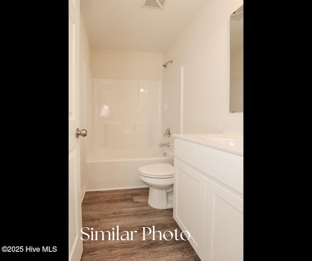 128 Buckskin Dr, Pollocksville, NC 28573 - full bathroom featuring vanity, wood finished floors, and shower / bathtub combination