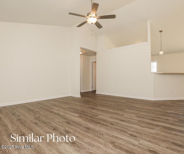 128 Buckskin Dr, Pollocksville, NC 28573 - unfurnished living room with a ceiling fan, high vaulted ceiling, and wood finished floors