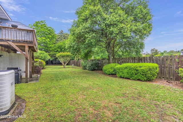 view of yard featuring central AC