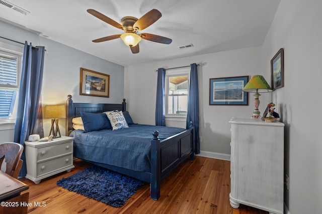 141 Bayview Blvd, Atlantic Beach, NC 28512 - bedroom with wood finished floors, ceiling fan, and baseboards