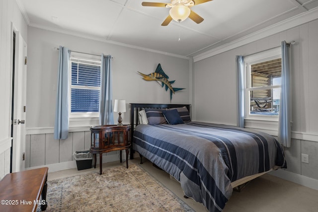 141 Bayview Blvd, Atlantic Beach, NC 28512 - bedroom featuring crown molding, a ceiling fan, and wainscoting