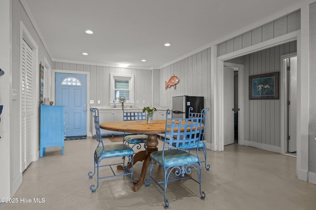 141 Bayview Blvd, Atlantic Beach, NC 28512 - dining space featuring ornamental molding, finished concrete flooring, and recessed lighting