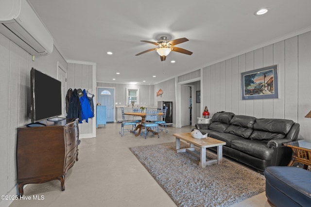 141 Bayview Blvd, Atlantic Beach, NC 28512 - living area featuring a wall mounted air conditioner, ornamental molding, a ceiling fan, concrete floors, and recessed lighting