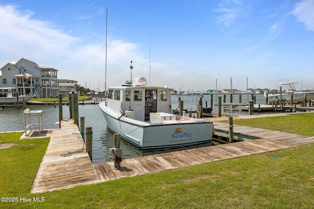 141 Bayview Blvd, Atlantic Beach, NC 28512 - dock featuring a lawn, a water view, and boat lift