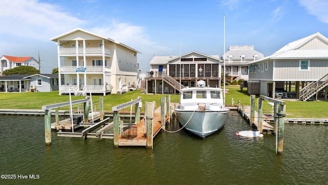 141 Bayview Blvd, Atlantic Beach, NC 28512 - dock featuring stairs, boat lift, a water view, and a residential view