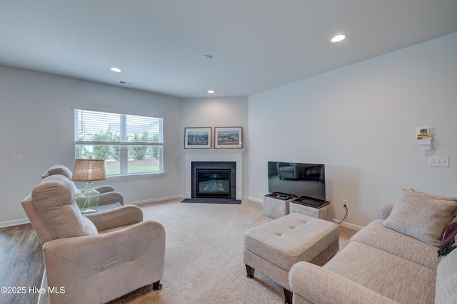 5112 Fortuna Dr, Leland, NC 28451 - living area featuring baseboards, recessed lighting, and a fireplace with flush hearth