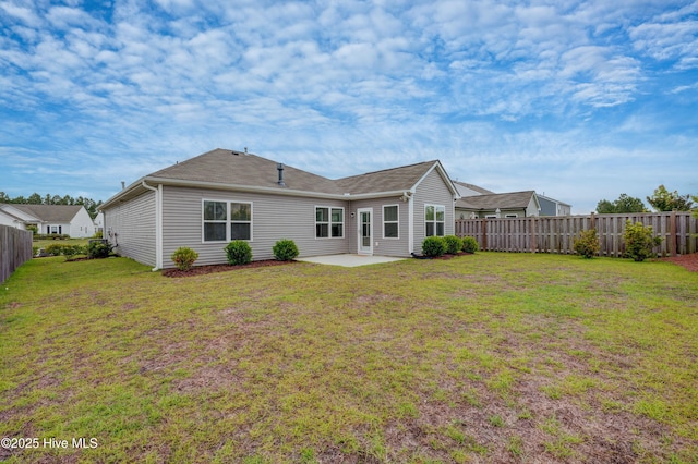 5112 Fortuna Dr, Leland, NC 28451 - rear view of house with a patio area