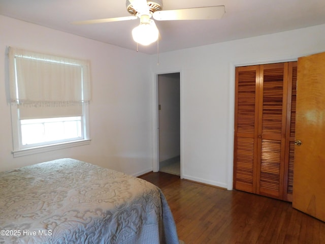 404 N Marlboro St, Mccoll, SC 29570 - bedroom with wood finished floors, a closet, a ceiling fan, and baseboards