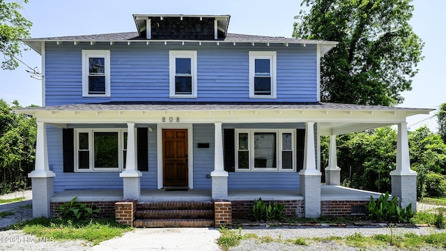 808 Green St, New Bern, NC 28560 - american foursquare style home featuring covered porch and a shingled roof