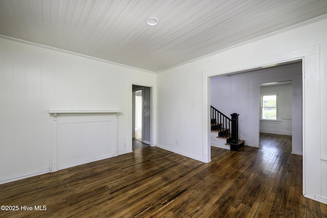 808 Green St, New Bern, NC 28560 - empty room featuring dark wood-style flooring, stairs, and crown molding