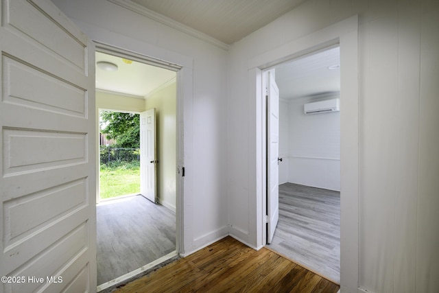 808 Green St, New Bern, NC 28560 - hall with a wall mounted air conditioner, wood finished floors, ornamental molding, and baseboards