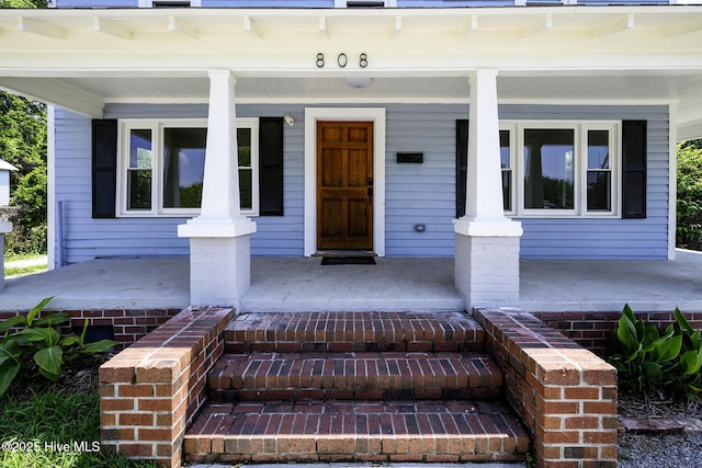 808 Green St, New Bern, NC 28560 - doorway to property with a porch