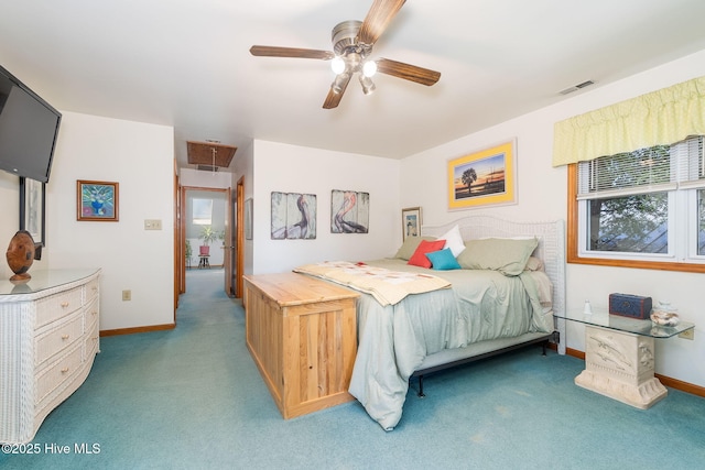 carpeted bedroom with multiple windows, baseboards, and a ceiling fan