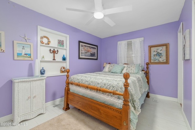 bedroom with baseboards and ceiling fan
