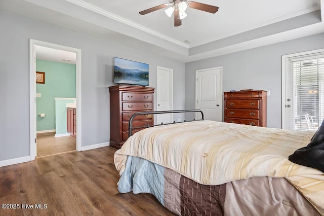 312 Hughes Ln, Jacksonville, NC 28546 - bedroom featuring wood finished floors, crown molding, baseboards, access to outside, and ensuite bathroom