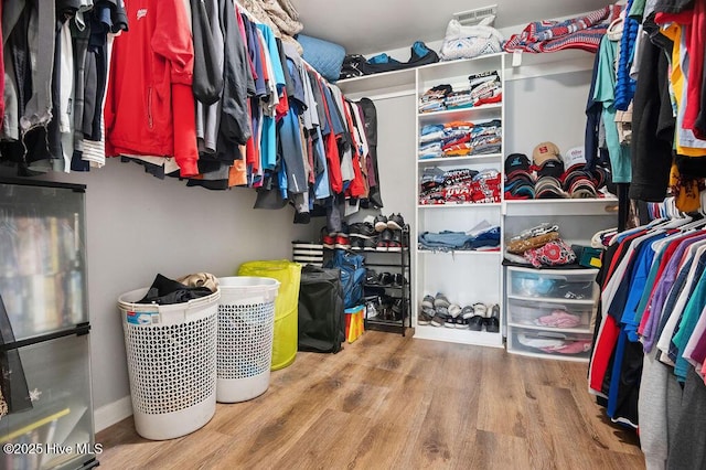 312 Hughes Ln, Jacksonville, NC 28546 - spacious closet featuring wood finished floors