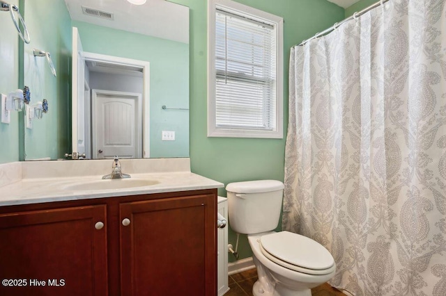 312 Hughes Ln, Jacksonville, NC 28546 - bathroom with toilet, vanity, and tile patterned flooring