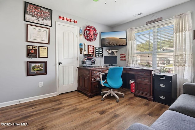 312 Hughes Ln, Jacksonville, NC 28546 - home office with wood finished floors and baseboards