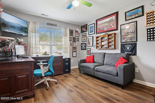 312 Hughes Ln, Jacksonville, NC 28546 - home office featuring ceiling fan, wood finished floors, and baseboards