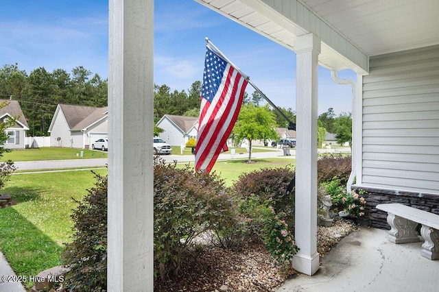 312 Hughes Ln, Jacksonville, NC 28546 - view of patio with a residential view and a porch