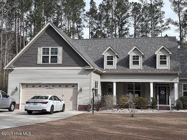 201 Shreveport Ct, Havelock, NC 28532 - view of front of house featuring concrete driveway, a porch, an attached garage, and roof with shingles