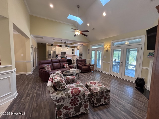 201 Shreveport Ct, Havelock, NC 28532 - living area featuring dark wood-type flooring, a skylight, french doors, a ceiling fan, and high vaulted ceiling