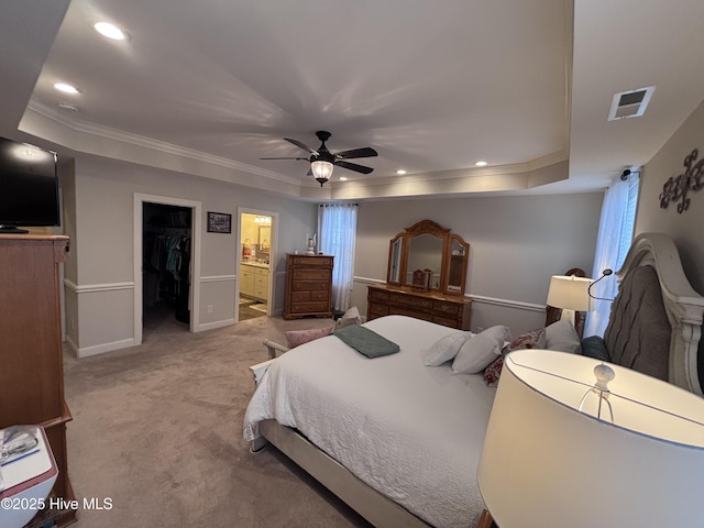 201 Shreveport Ct, Havelock, NC 28532 - bedroom with a tray ceiling, light carpet, baseboards, crown molding, and connected bathroom