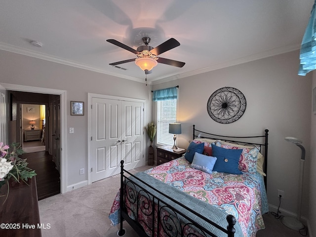 201 Shreveport Ct, Havelock, NC 28532 - carpeted bedroom with crown molding, a closet, baseboards, and ceiling fan