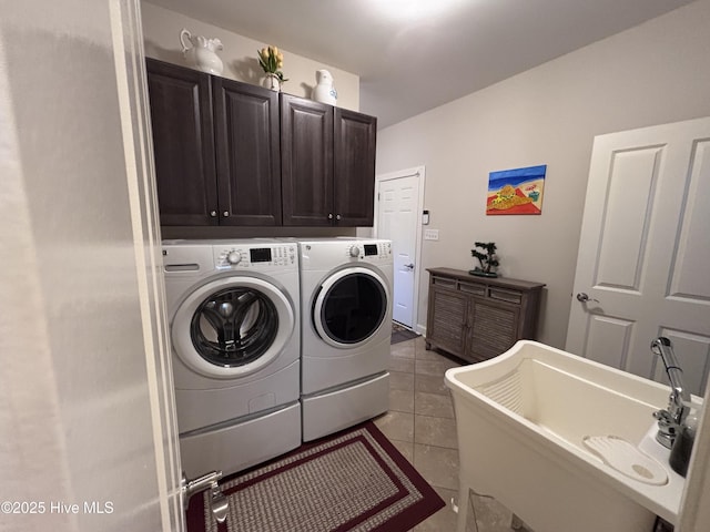 201 Shreveport Ct, Havelock, NC 28532 - laundry area featuring washer and clothes dryer, cabinet space, and tile patterned flooring