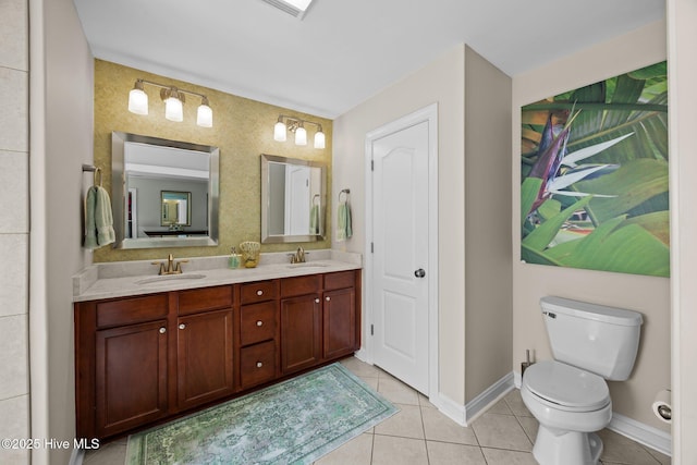 903 Buckingham Rd, Trent Woods, NC 28562 - full bathroom with tile patterned floors, toilet, double vanity, and baseboards