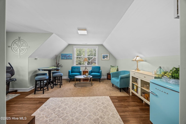 903 Buckingham Rd, Trent Woods, NC 28562 - sitting room with dark wood finished floors, vaulted ceiling, and baseboards