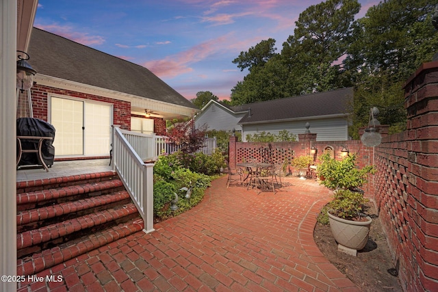 903 Buckingham Rd, Trent Woods, NC 28562 - patio terrace at dusk featuring fence