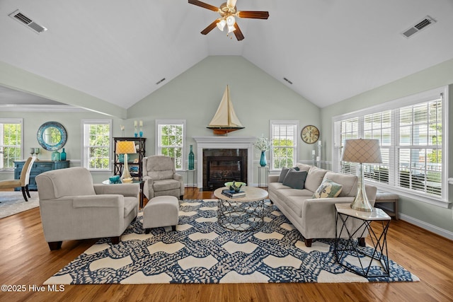 903 Buckingham Rd, Trent Woods, NC 28562 - living room with ceiling fan, wood finished floors, a tile fireplace, and high vaulted ceiling