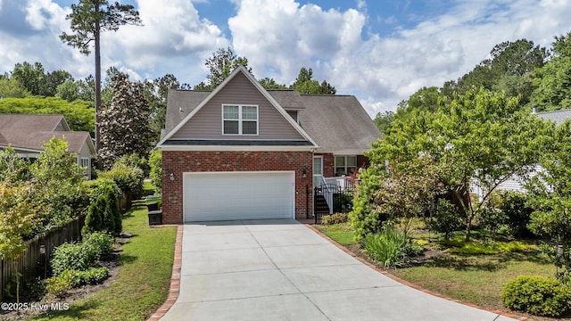 903 Buckingham Rd, Trent Woods, NC 28562 - traditional home featuring brick siding, concrete driveway, and fence