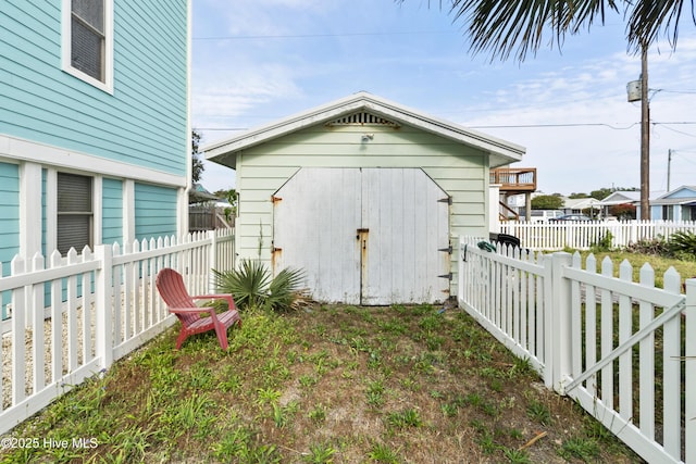 view of shed with a fenced backyard