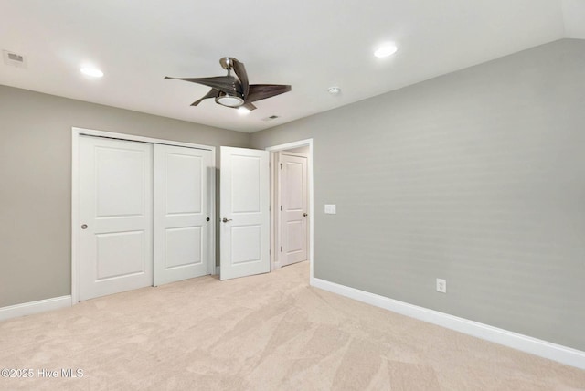 3524 Laughing Gull Ter, Wilmington, NC 28412 - unfurnished bedroom featuring light colored carpet, baseboards, a closet, a ceiling fan, and recessed lighting
