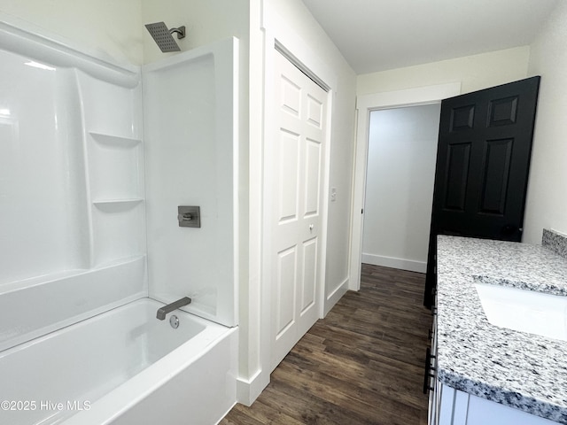 200 Colonial Ave, Clinton, NC 28328 - bathroom featuring wood finished floors, vanity, and shower / bath combination