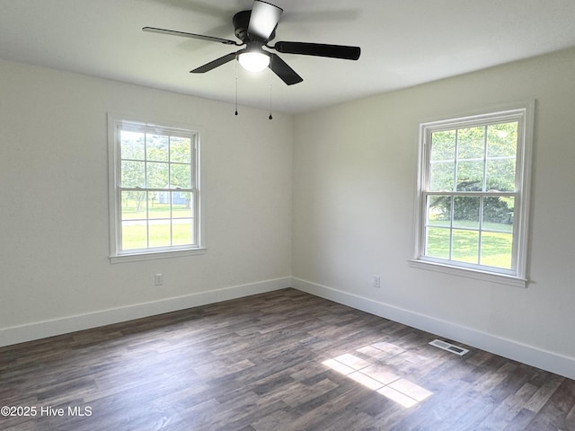 200 Colonial Ave, Clinton, NC 28328 - unfurnished room with ceiling fan and dark wood finished floors