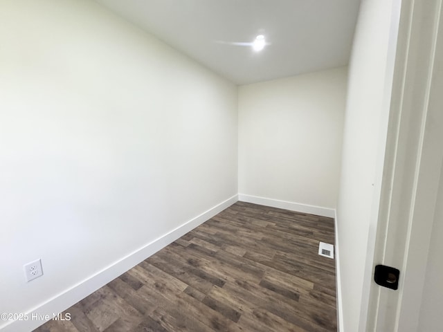 200 Colonial Ave, Clinton, NC 28328 - empty room with baseboards and dark wood-style flooring