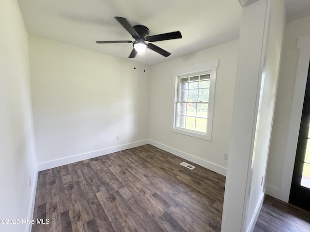 200 Colonial Ave, Clinton, NC 28328 - unfurnished room with dark wood-style floors and ceiling fan