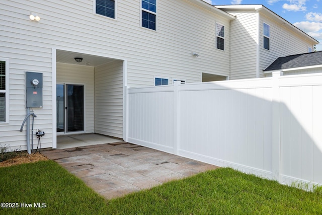 view of yard with a patio area and fence