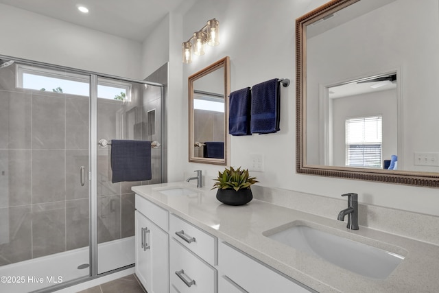 1009 Gathering Way, Wilmington, NC 28412 - full bath featuring double vanity, a shower stall, and recessed lighting